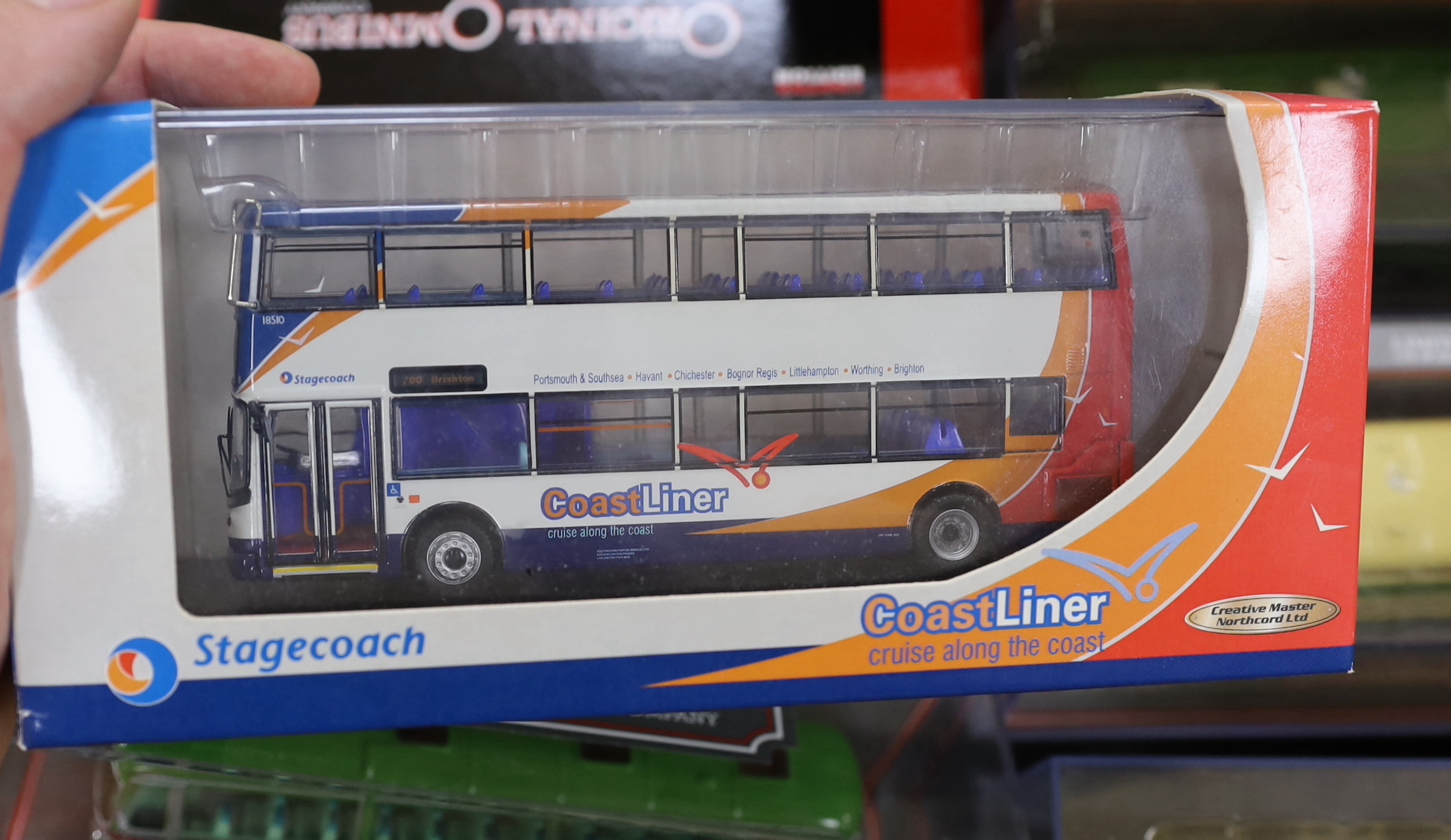 A collection of Creative Master, Corgi OOC and Corgi buses and coaches, all Brighton & Hove or Southdown liveries, (24)